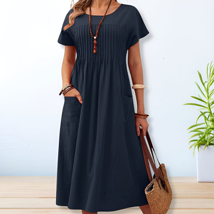 Flattering women's relaxed fit day dress, offering tummy coverage and versatile for casual or everyday wear.