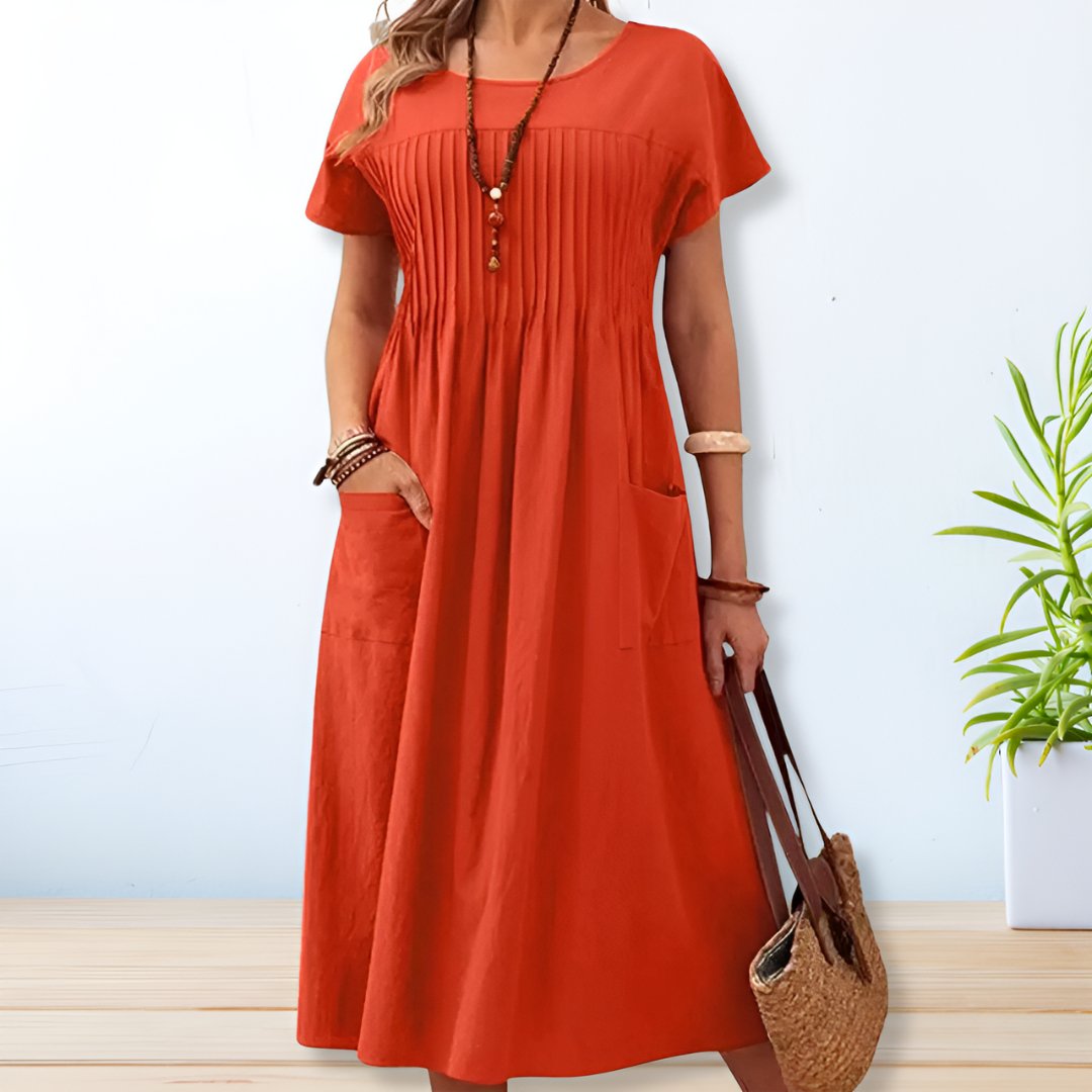 Comfortable women's short sleeve day dress with tummy coverage and pockets, ideal for spring & summer.