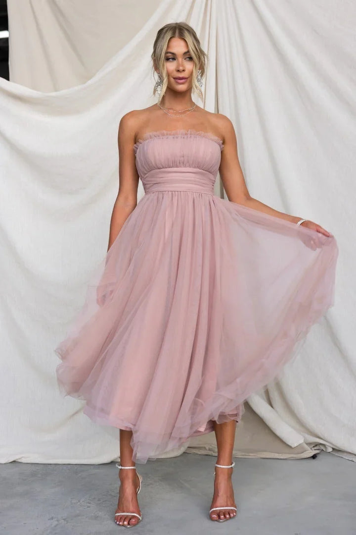 Vibrant yellow strapless maxi dress, a flattering long evening gown for women's formal events.