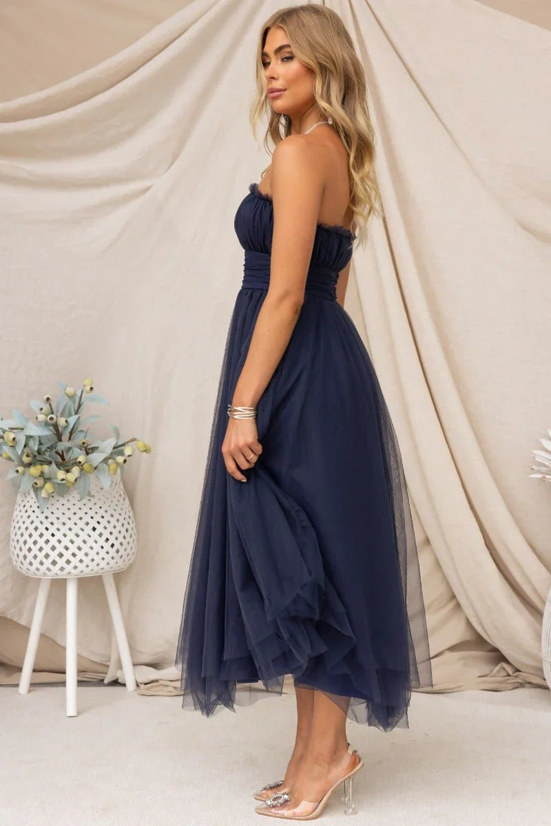 Flattering women's strapless maxi dress, an elegant long party gown perfect for evening wear.