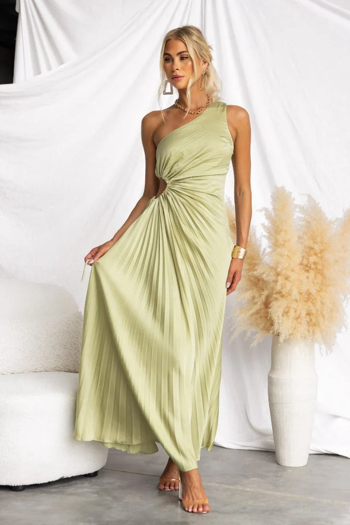 Vibrant green elegant maxi dress for women, one-shoulder design with a flattering cut-out, perfect for parties.