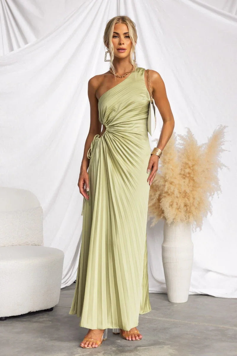 Fuschia one-shoulder cut-out maxi dress, an elegant women's evening gown with a chic tie waist detail.