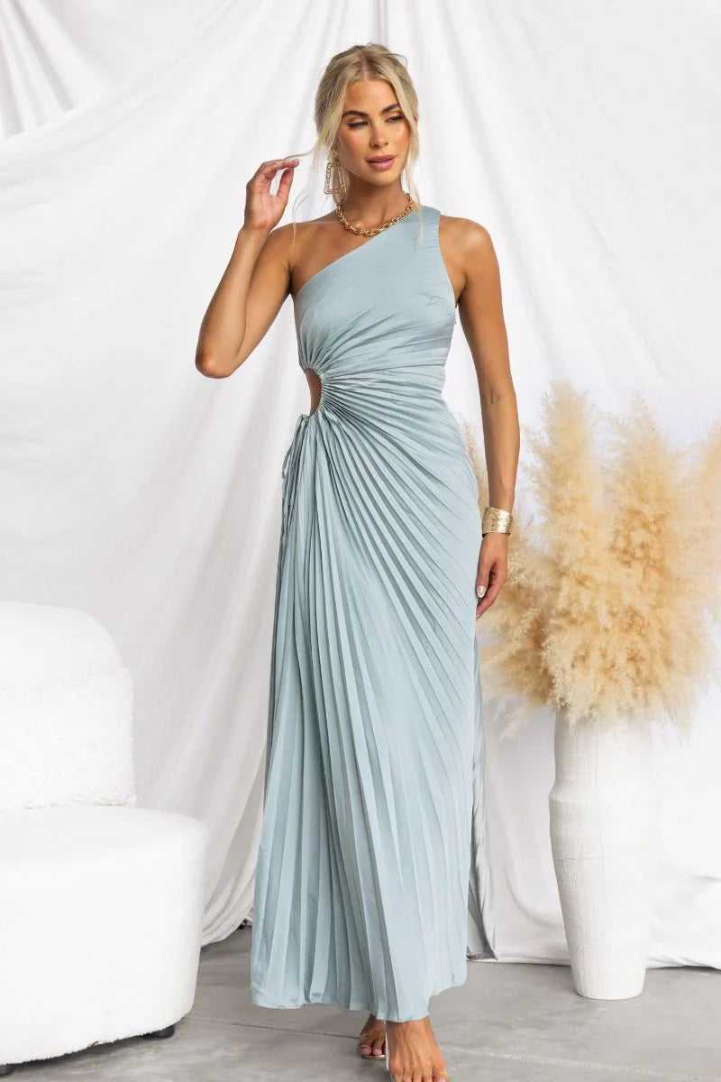 Striking fuschia one-shoulder party dress for women, long maxi length with a stylish cut-out design.