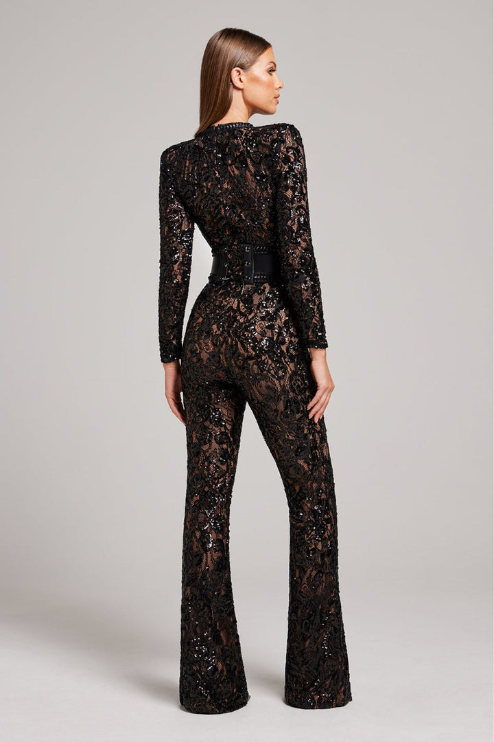 Women's elegant lace jumpsuit with wide leg & long sleeves. Chic & sophisticated eveningwear party outfit.