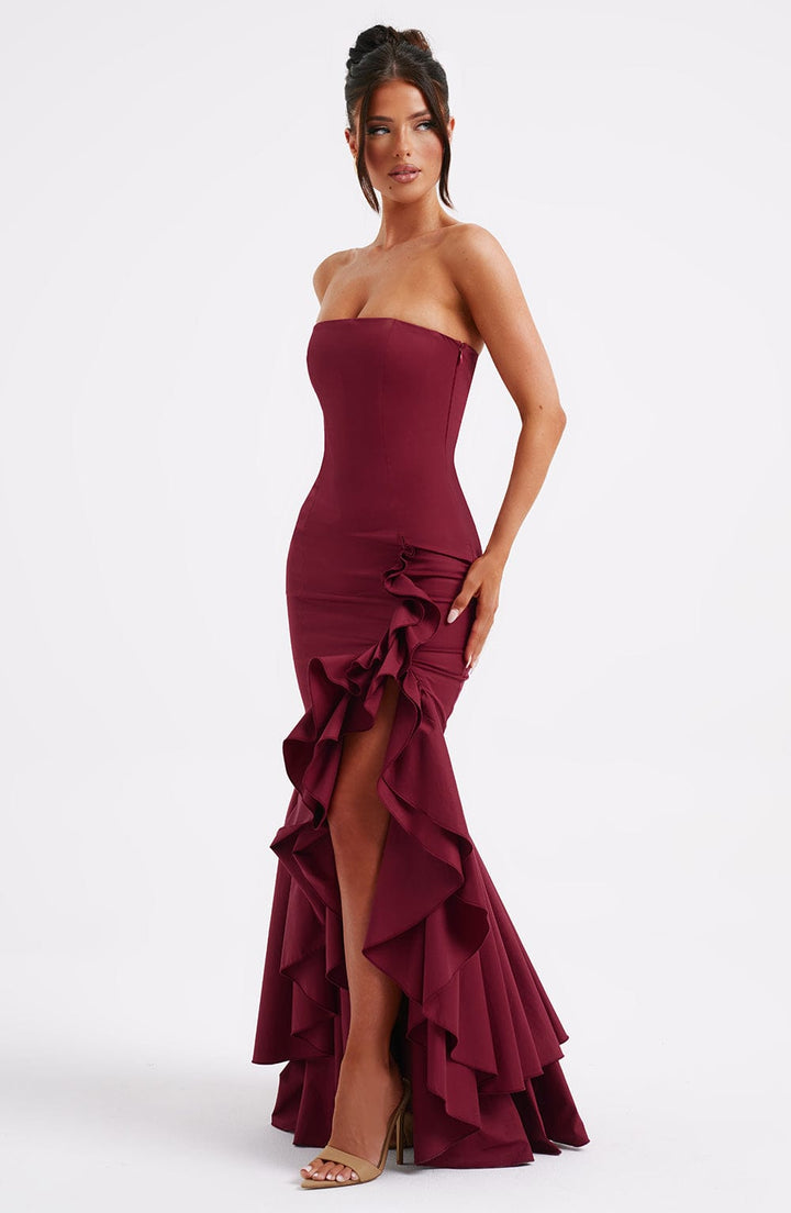 Chic sleeveless maxi dress for women featuring elegant ruffles & a stylish leg slit. Ideal for parties.