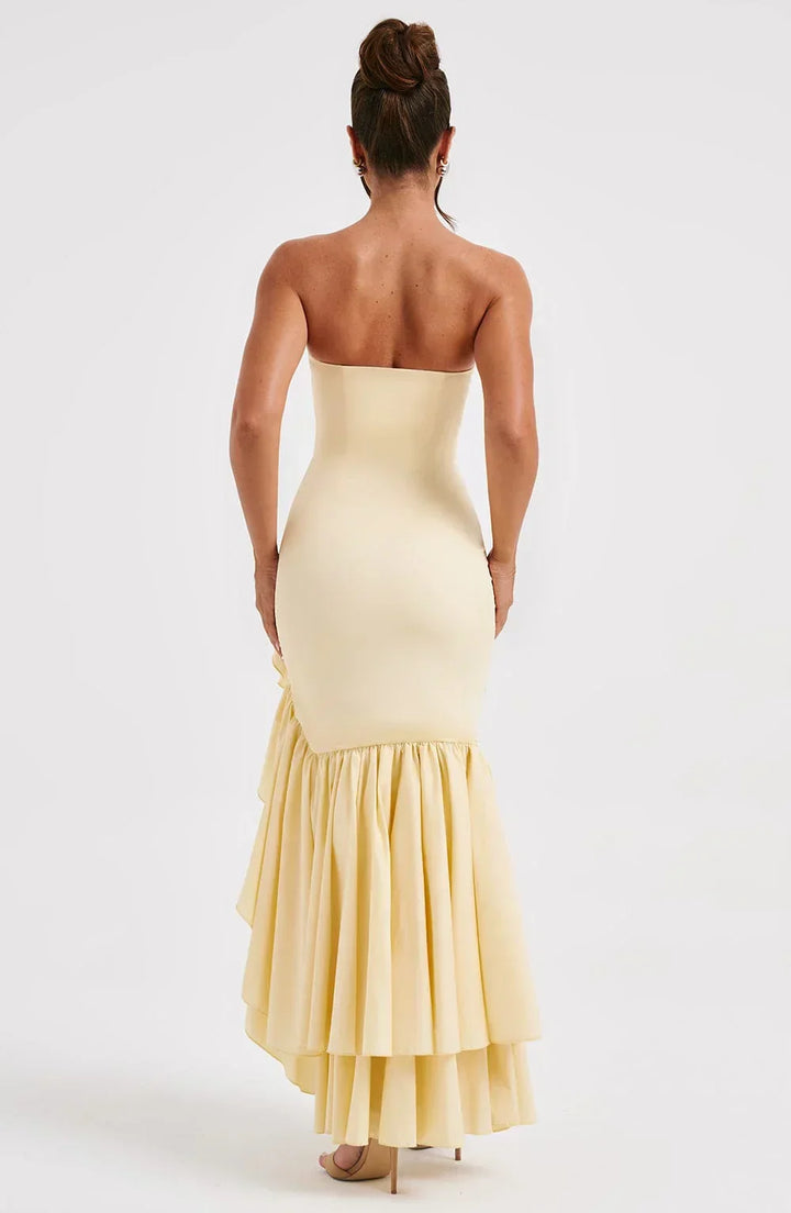Women's sophisticated sleeveless ruffle maxi dress with a high slit, perfect for evening wear.