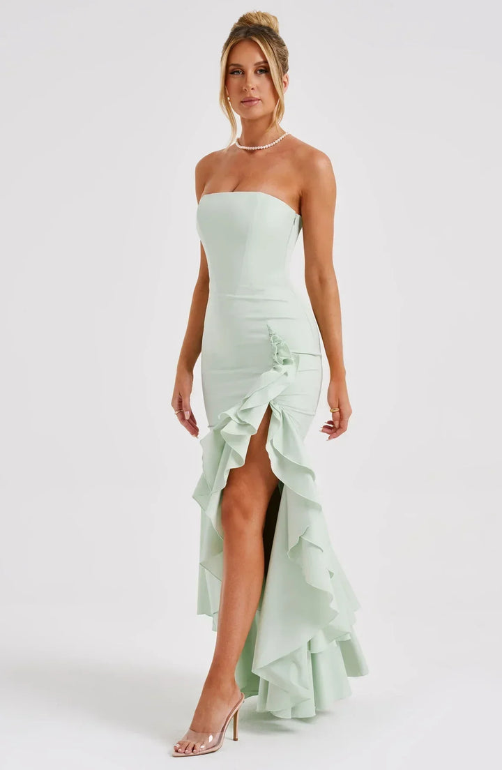 Women's beautiful sleeveless maxi dress with ruffles & an elegant leg slit, ideal for celebrations.