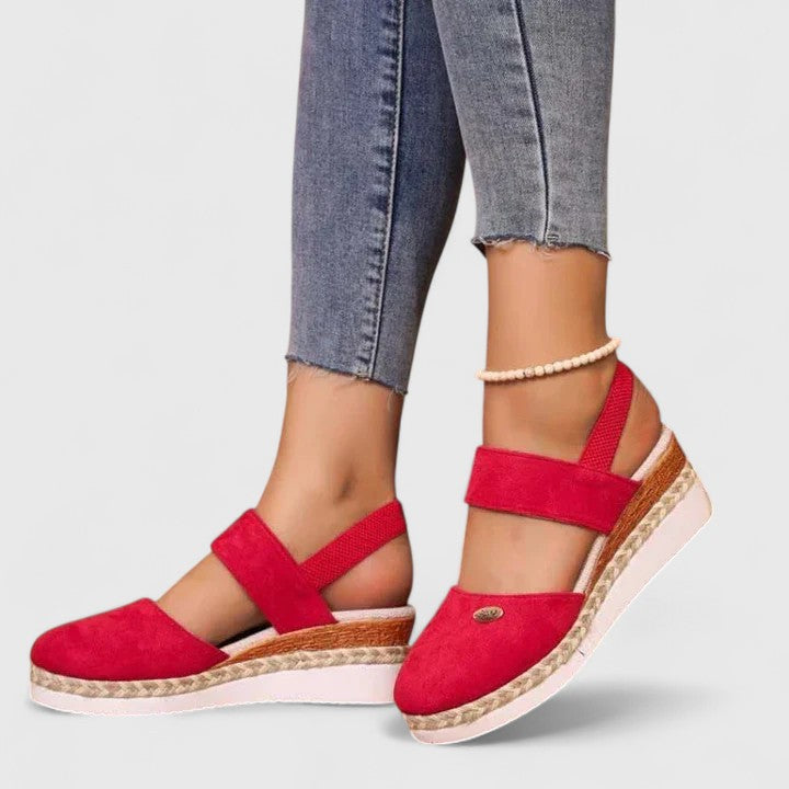 Sleek women's orthopaedic sandals, designed for comfort with arch support and soft cushioning.