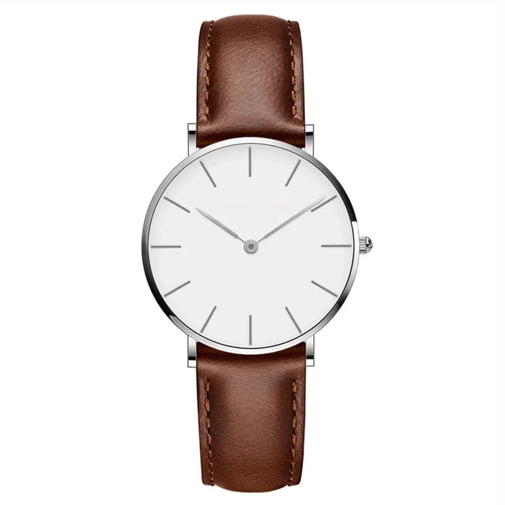 Fashionable women's round leather watch, minimalist design, elegant and perfect for daily wear.
