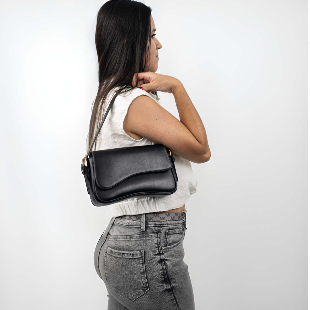 Elegant genuine leather shoulder bag for women, a timeless fashion accessory.