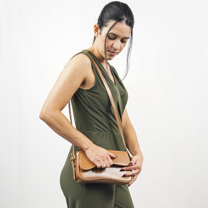 Sophisticated women's genuine leather crossbody bag, a versatile fashion statement.