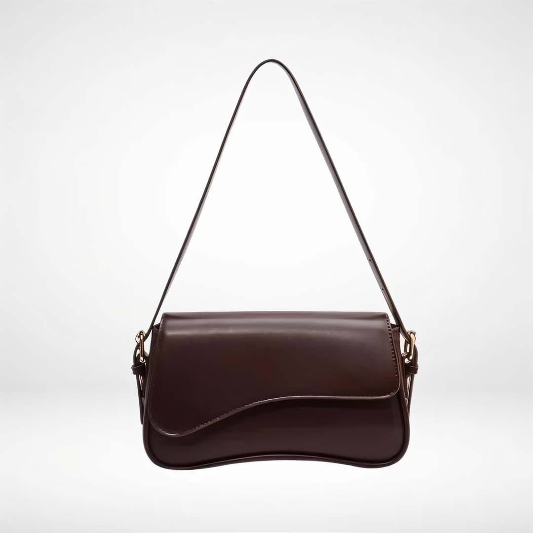 Women's elegant genuine leather shoulder bag, versatile for everyday and evening wear.