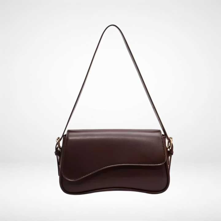 Women's elegant genuine leather shoulder bag, versatile for everyday and evening wear.