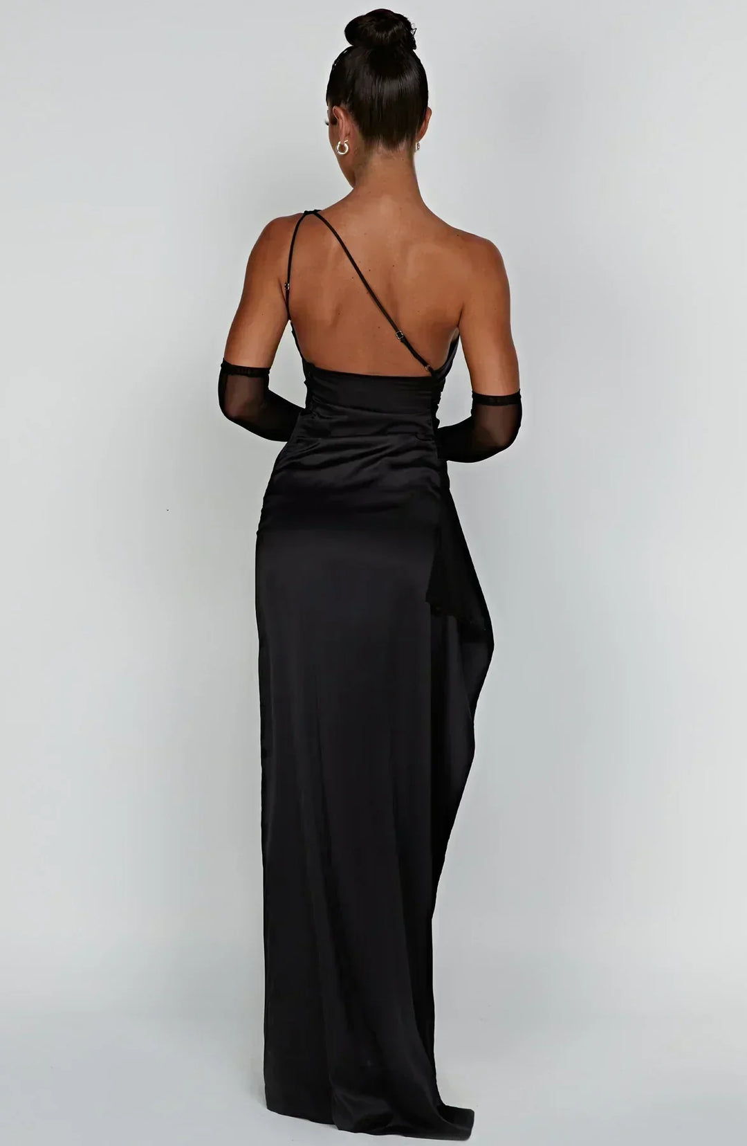 Glamorous one-shoulder party dress, high slit, maxi length, and ruched details.