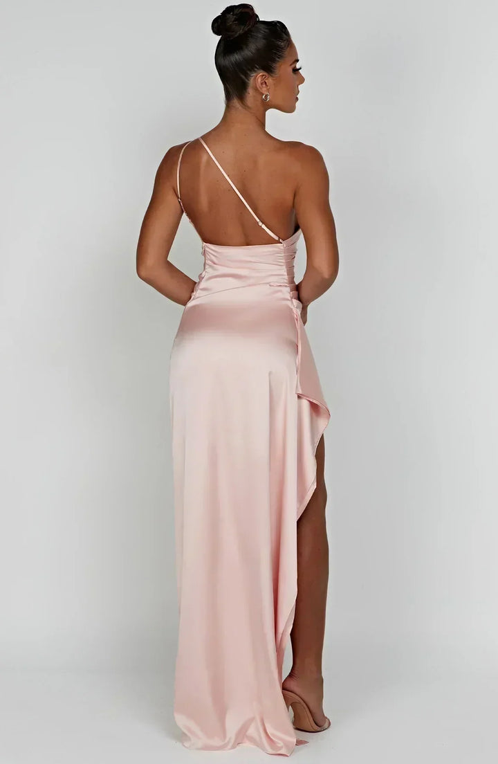 Glamorous one-shoulder maxi dress, high slit, designed for a stunning evening.