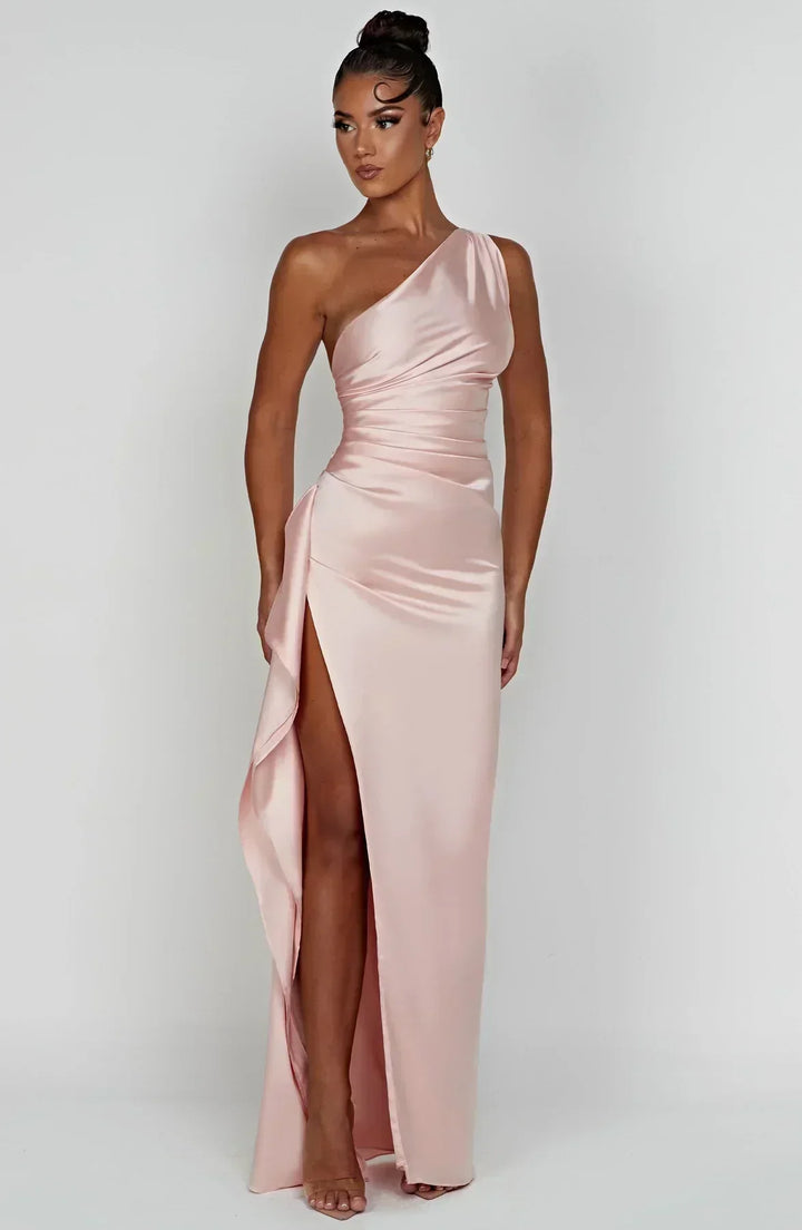 One-shoulder evening gown with high slit, a glamorous choice for formal events.