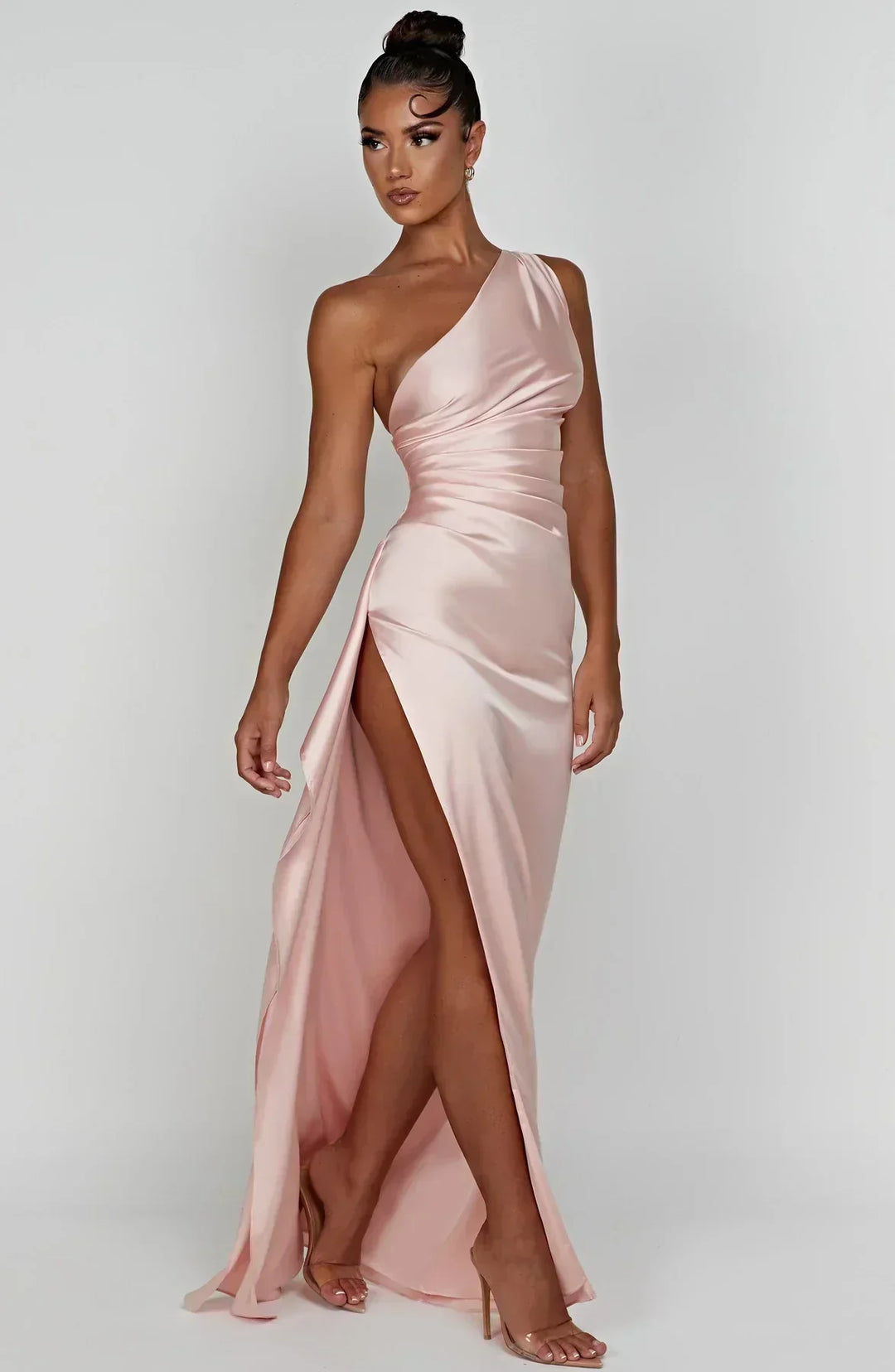 Sophisticated one-shoulder party dress, maxi length, and alluring high slit.