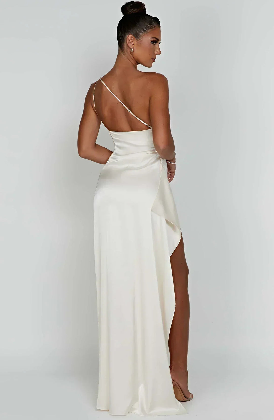 Women's one-shoulder evening gown with high slit, glamorous for formal occasions.