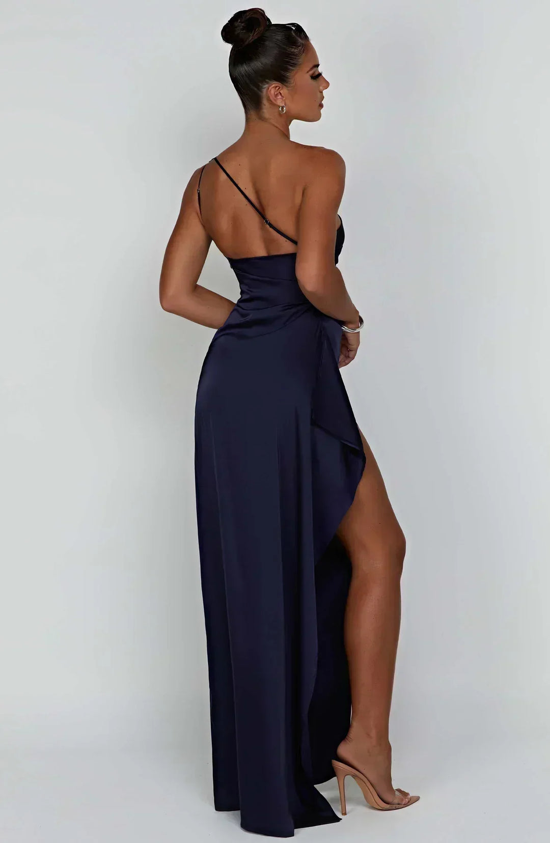 Ruched one-shoulder maxi dress, high slit, a chic choice for any party.