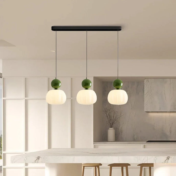 "Art Deco Cream Pendant Light with Bauhaus design, features high-quality metal frame and warm glow for elegant home lighting.