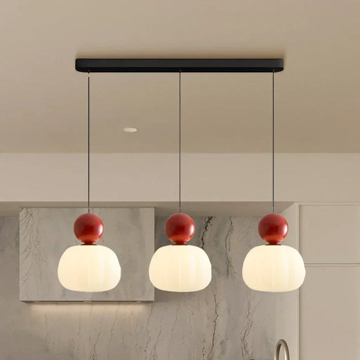 "Art Deco Cream Pendant Light with Bauhaus design, features high-quality metal frame and warm glow for elegant home lighting.