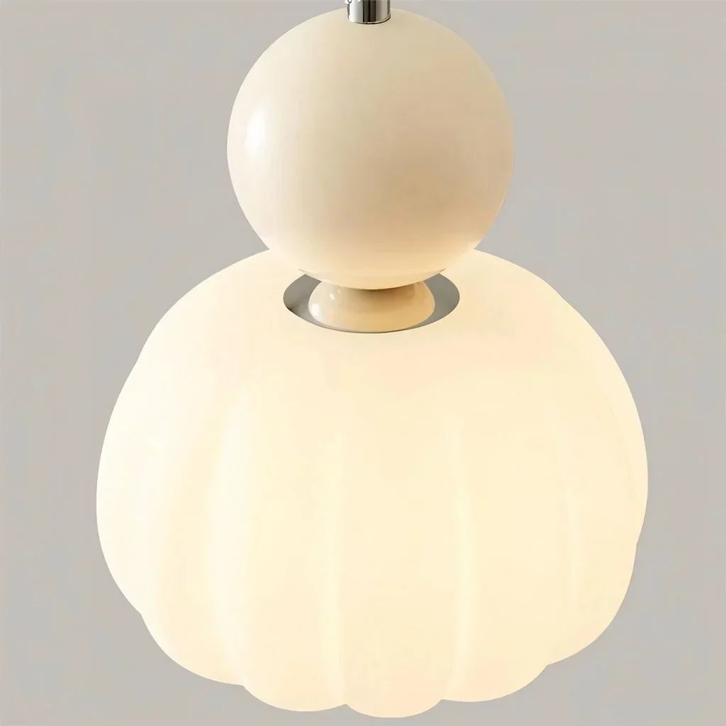 "Art Deco Cream Pendant Light with Bauhaus design, features high-quality metal frame and warm glow for elegant home lighting.