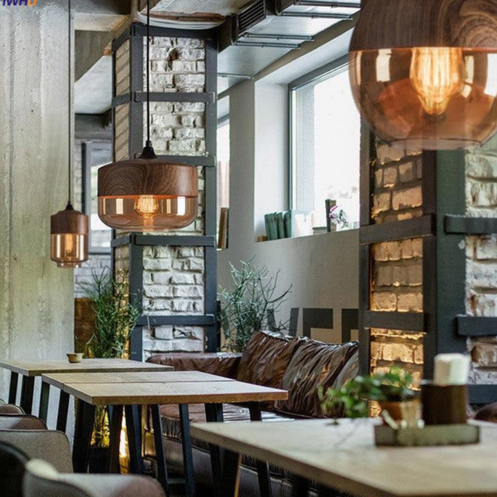 Minimalist wooden pendant lamp, Nordic design providing a soft, warm glow.