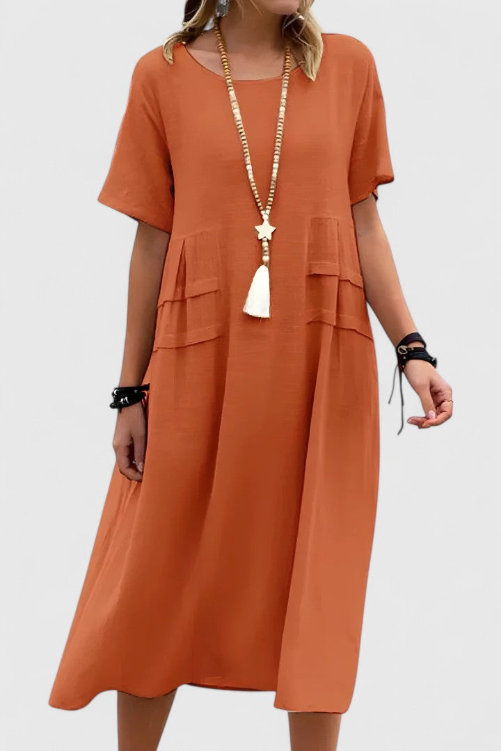 Elegant women's midi dress, versatile day-to-night style. Flattering fit for special occasions & comfort. Chic summer fashion.