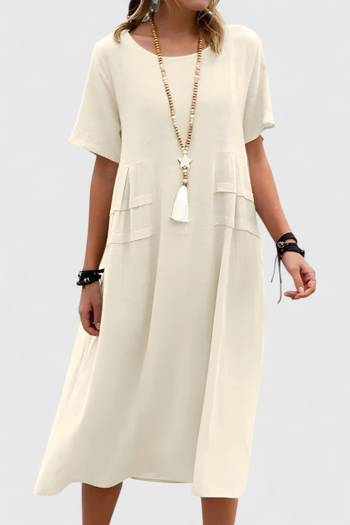 Flattering women's midi dress, comfortable & chic. Versatile style for day-to-night wear or special occasions. Elegant fashion.