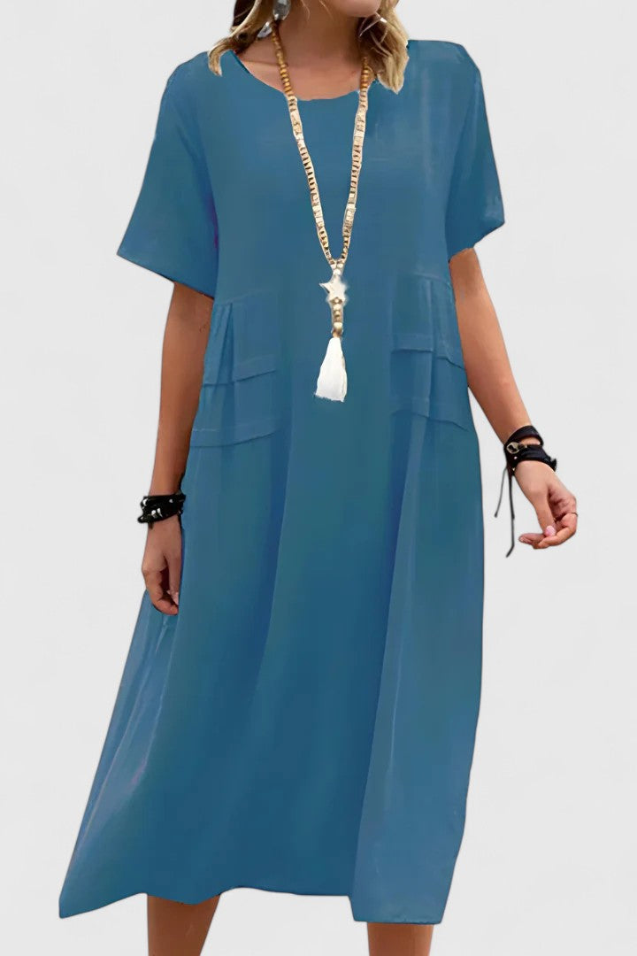 Chic elegant women's midi dress. Perfect versatile style for summer, day-to-night, or special occasions. Flattering comfort.