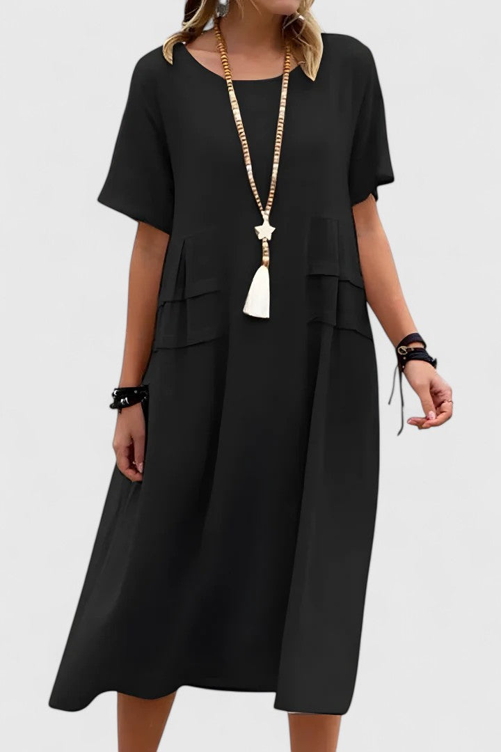Versatile women's midi dress with an elegant, flattering fit. Chic day-to-night style, comfortable for summer & special occasions.