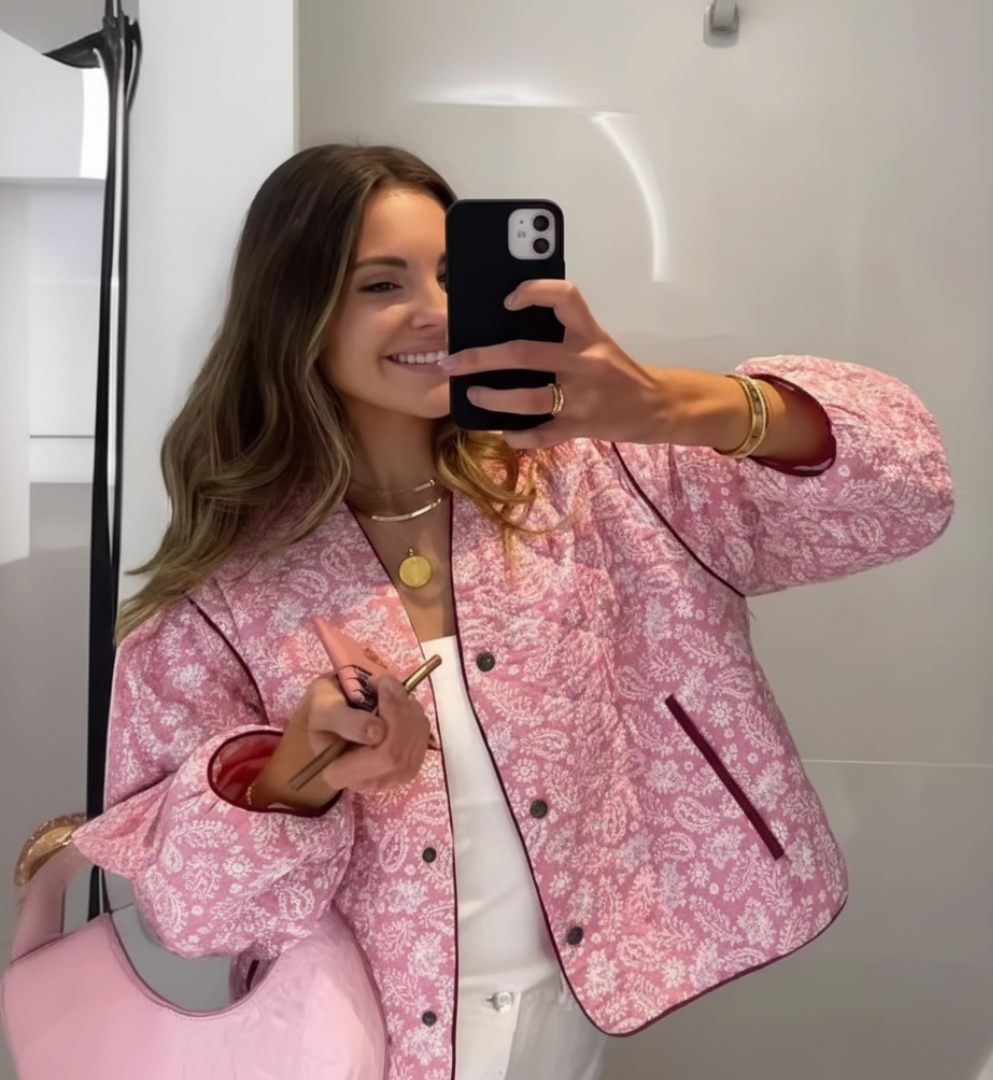 Stylish women's floral quilted outerwear. Button-front jacket, ideal for elegant casual or winter fashion.
