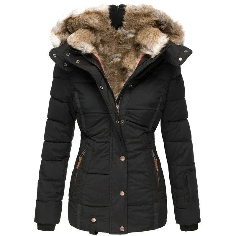 Women's luxury winter puffer jacket with plush faux fur hood, perfect for elegant cold weather style.