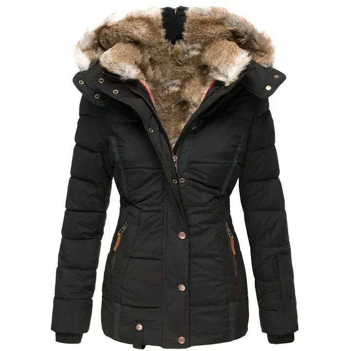 Women's luxury winter puffer jacket with plush faux fur hood, perfect for elegant cold weather style.