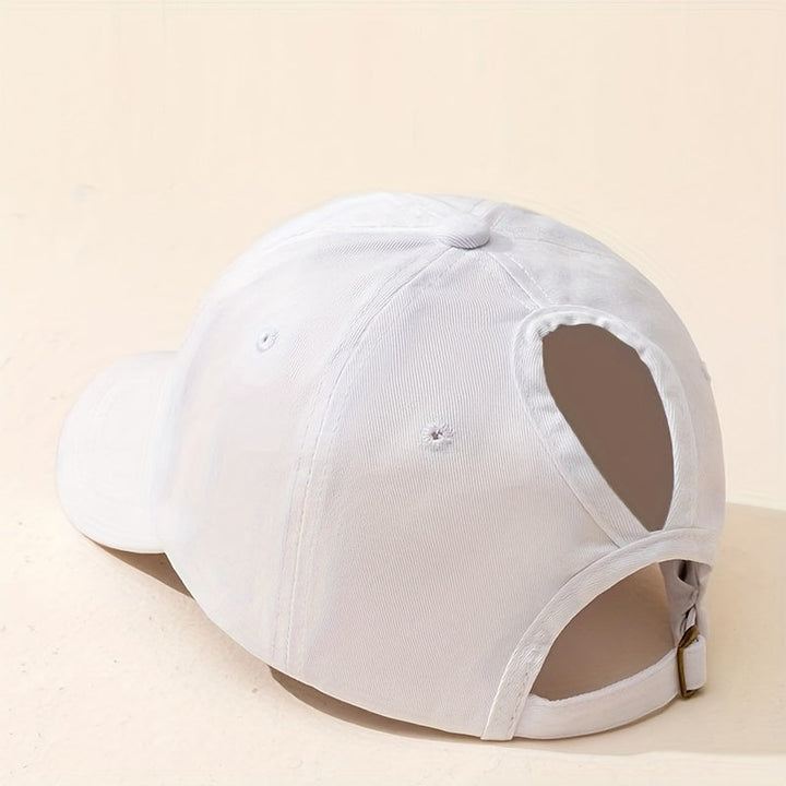 Fashionable women's ponytail cap, a versatile accessory for sun protection, sport, and everyday casual wear.