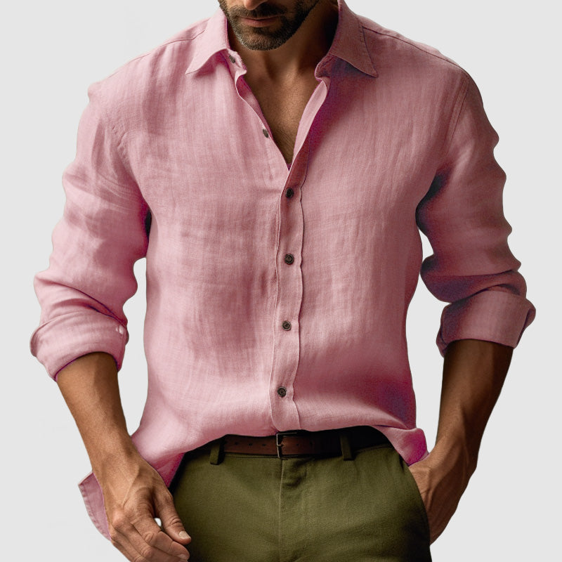 Man wearing a stylish long sleeve button-down shirt, perfect for casual outings or smart-casual events.
