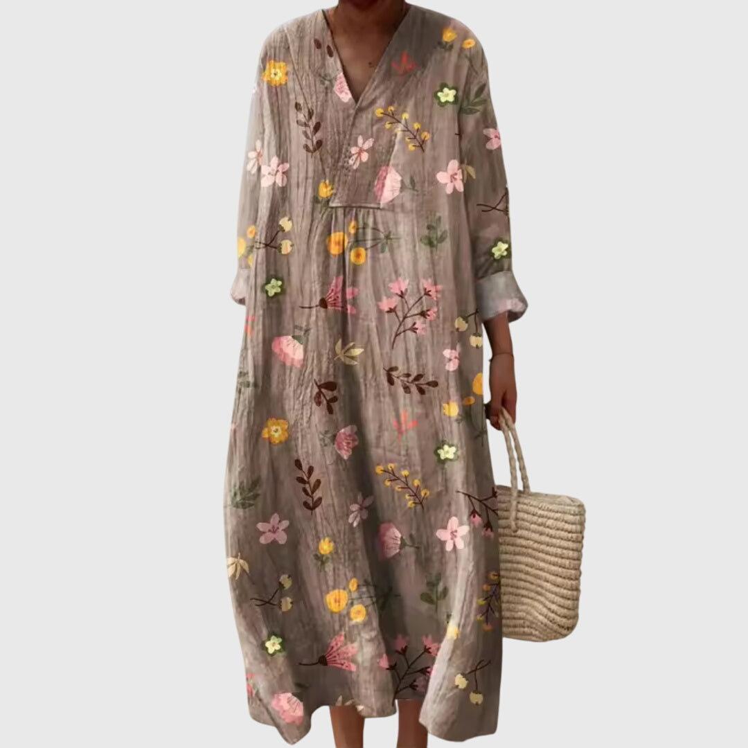 Stylish women's maxi dress featuring a unique geometric print & modern design. Ideal for ladies fashion.