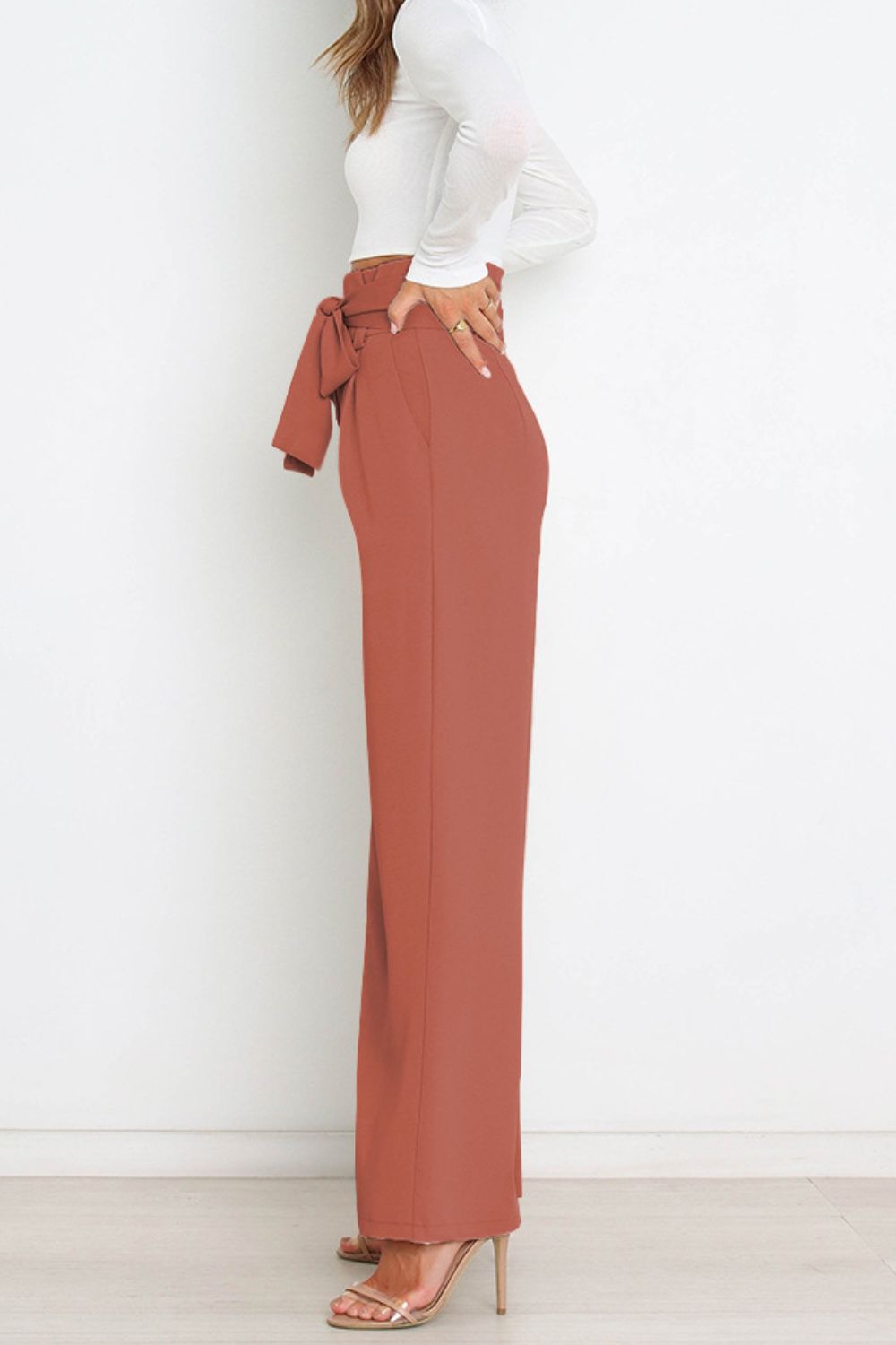Chic women's high waist paperbag pants with a bow belt, ideal for spring & summer.