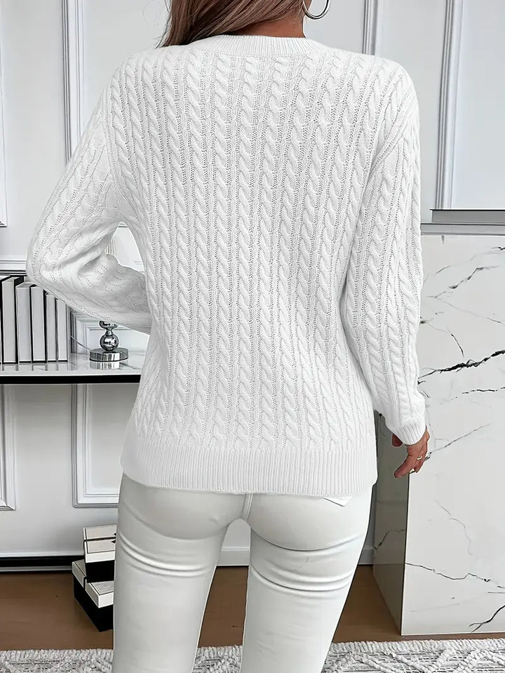 Soft knit women's cable knit jumper. Cozy knitted top, perfect for winter fashion & layered clothing.