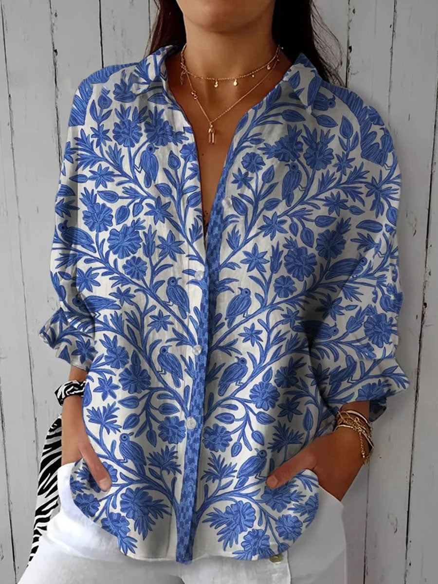 Women's casual collared floral print garden blouse. Elegant summer fashion top for versatile wear.