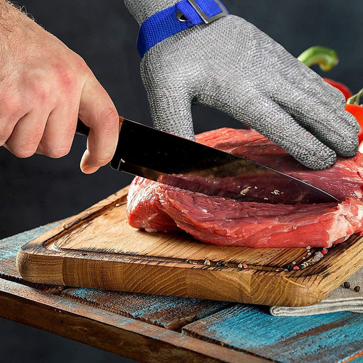 Durable stainless steel mesh safety glove, ideal for professional kitchens & meat processing tasks.