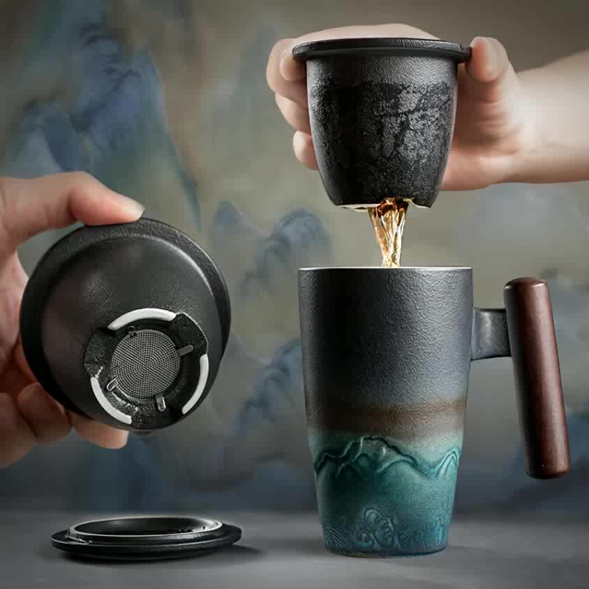 Artistic handcrafted ceramic tea mug with strainer; unisex design, comfortable, a perfect gift.