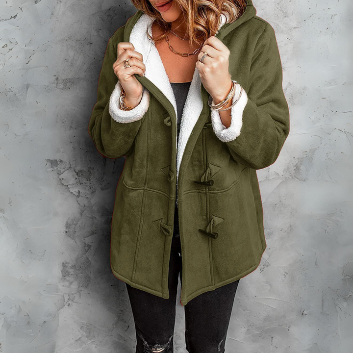 Fashionable women's Aspen fleece toggle coat featuring elegant toggles. Designed for stylish winter warmth.