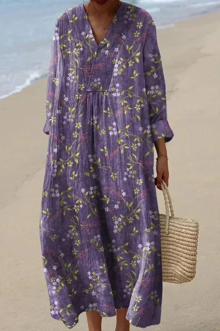 Elegant women's violet floral midi dress with a V-neck, A-line cut, perfect for summer casual or elegant wear.