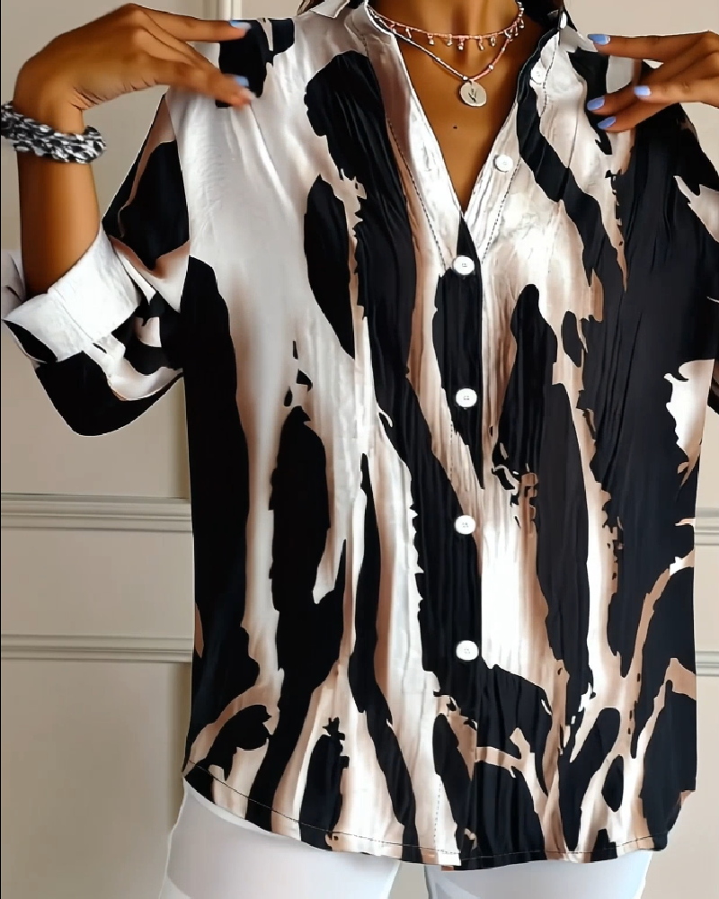 Fashionable women's irregular print stand collar blouse. Long sleeve casual top for spring & autumn.