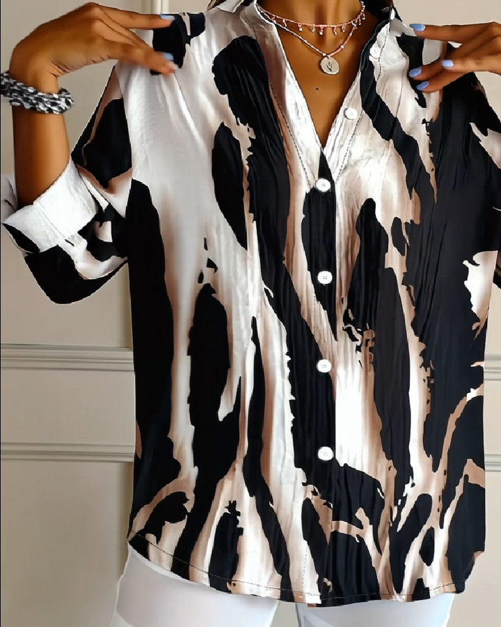 Fashionable women's irregular print stand collar blouse. Long sleeve casual top for spring & autumn.