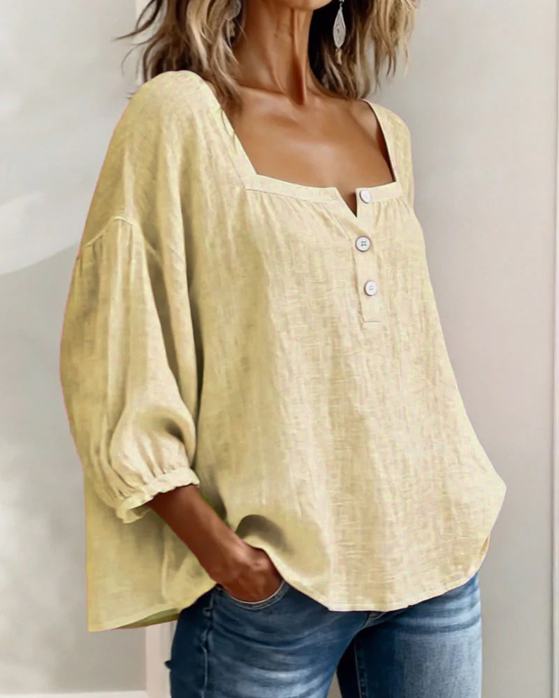 Chic women's relaxed puff sleeve blouse, a must-have for spring & summer outfits.