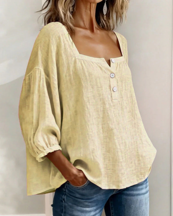 Chic women's relaxed puff sleeve blouse, a must-have for spring & summer outfits.