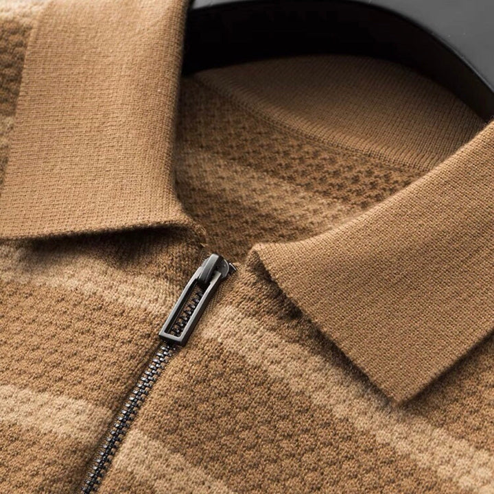 Modern men's half-zip polo shirt featuring a stylish striped pattern. Ideal for smart casual & everyday wear.
