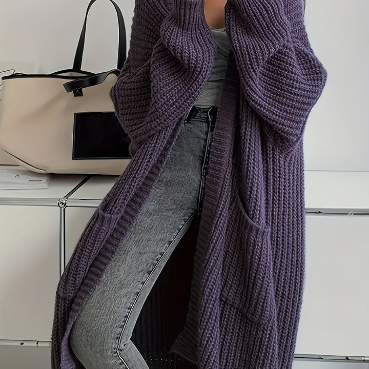 Autumn fashion essential: a cosy V-neck button-front knit cardigan sweater for women's style.